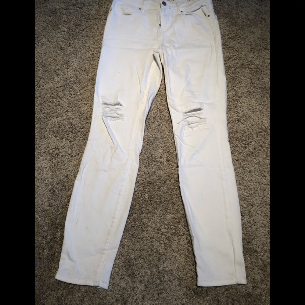 White jeans with holes